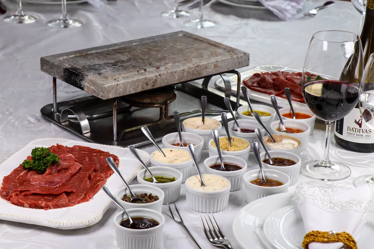 La Pierrade: meats on the hot stone with assorted sauces