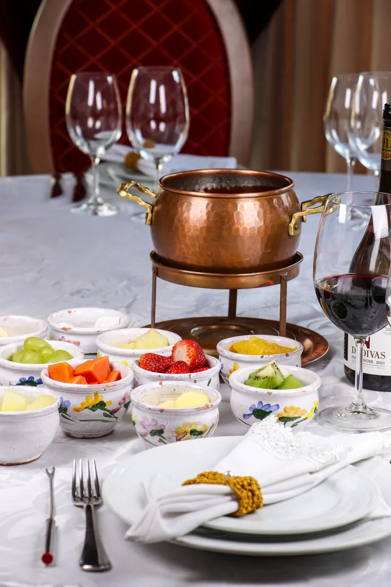 Chocolate fondue with fresh fruit and marshmallows